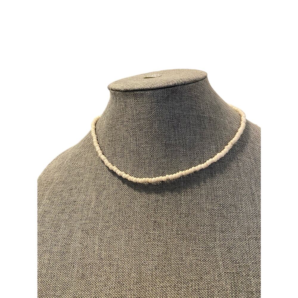 white bead necklace